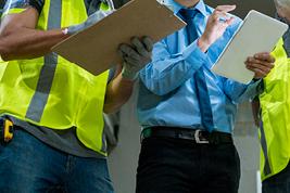 IMAGE: Person standing in OSHA Vest